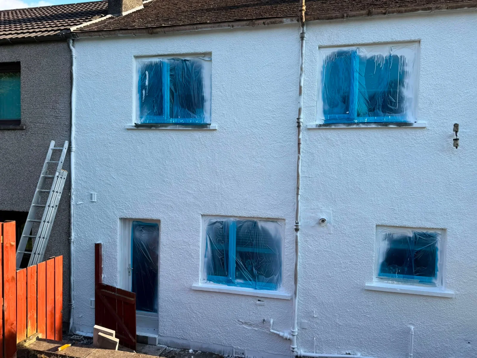 Freshly painted white exterior by Kev Kelly Decor & Maintenance